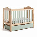 Babybett aus holz mit unterer schublade in grün und weißen matratze 130 x 70 x 90cm